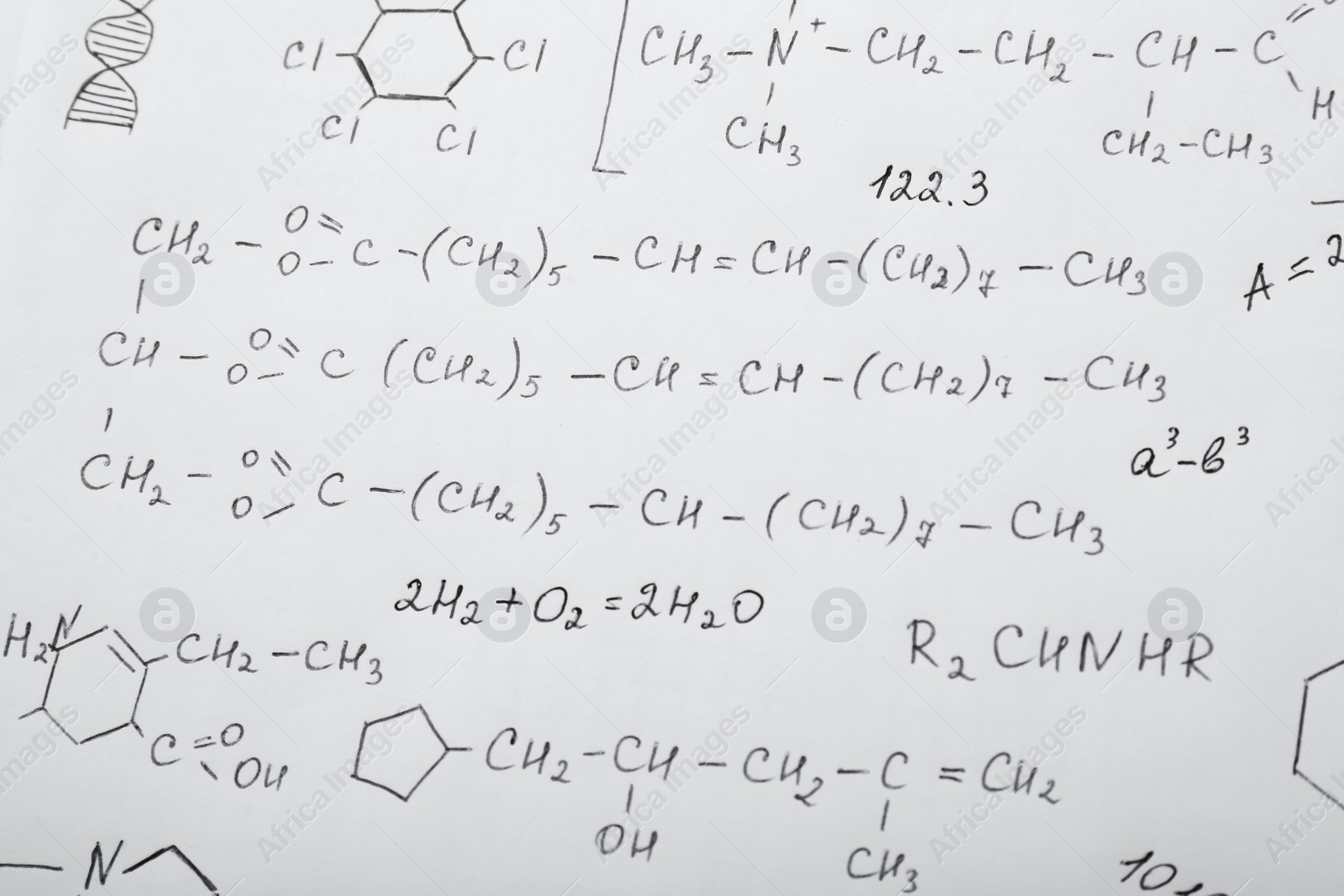 Photo of Sheet of paper with many different chemical formulas