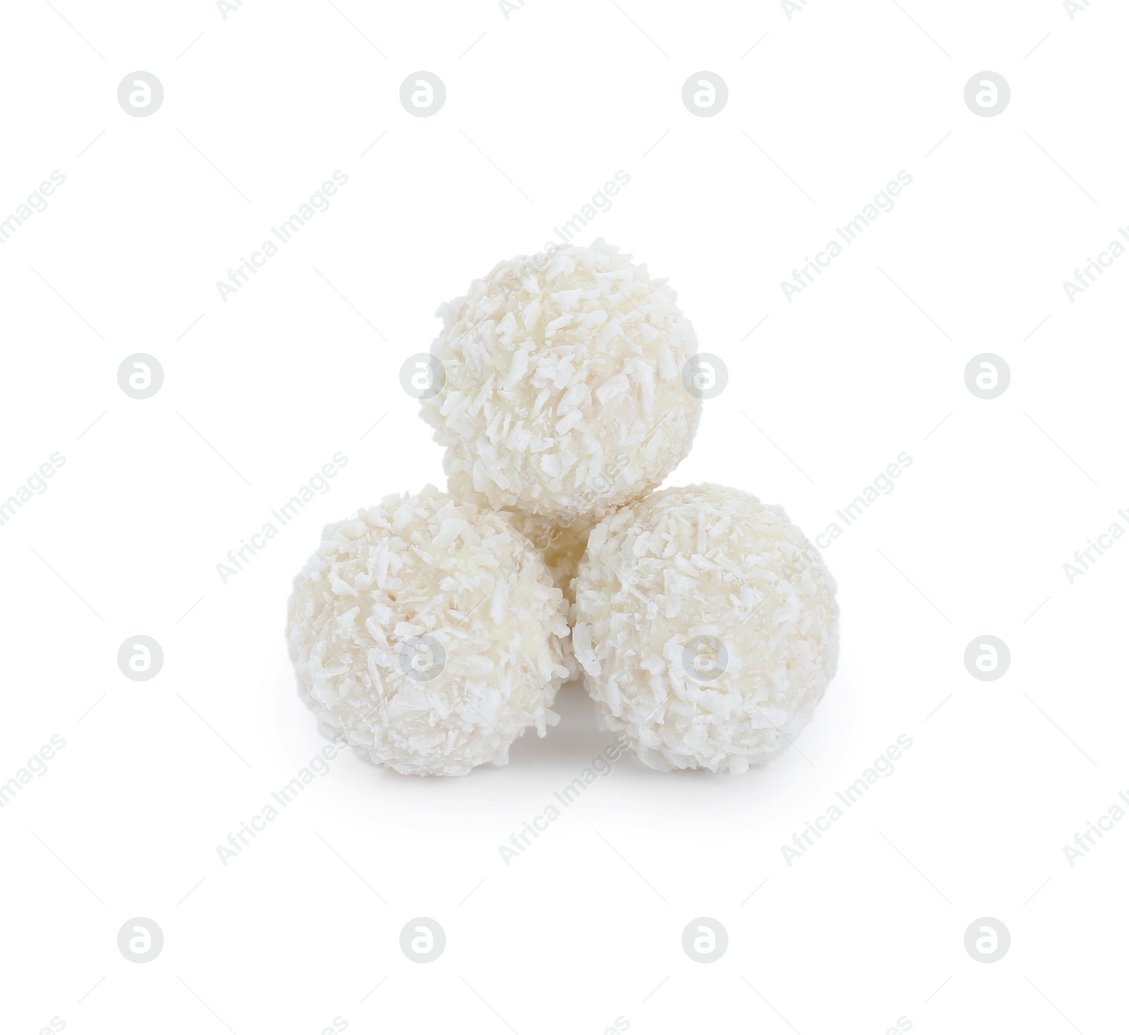 Photo of Tasty sweet coconut balls isolated on white