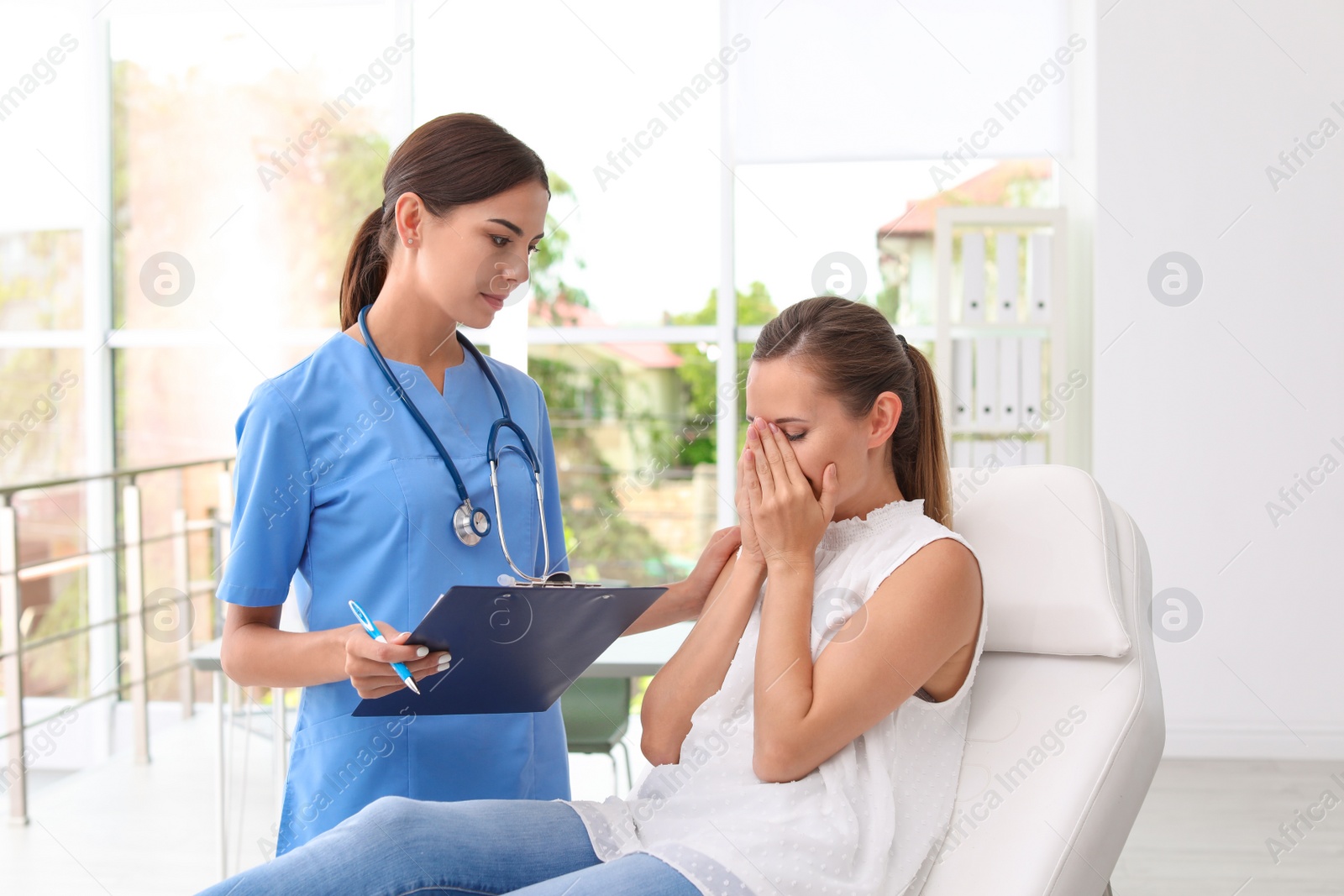 Photo of Patient having appointment with doctor in hospital