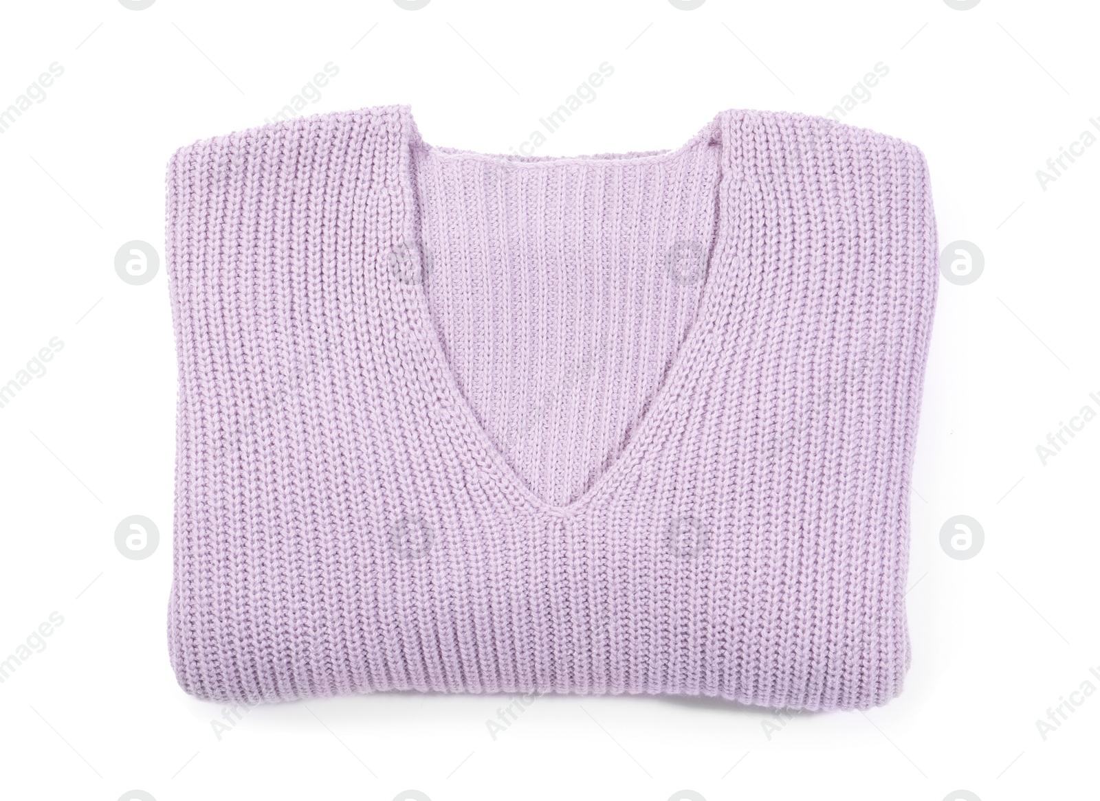 Photo of Folded cozy warm sweater on white background, top view