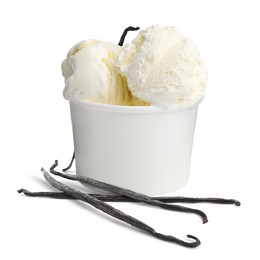 Delicious vanilla ice cream in paper cup and vanilla pods isolated on white