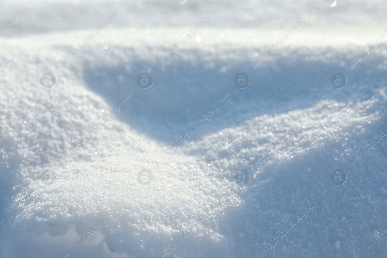 Photo of Beautiful snowdrift as background, closeup view. Winter weather