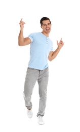 Photo of Handsome young man dancing on white background