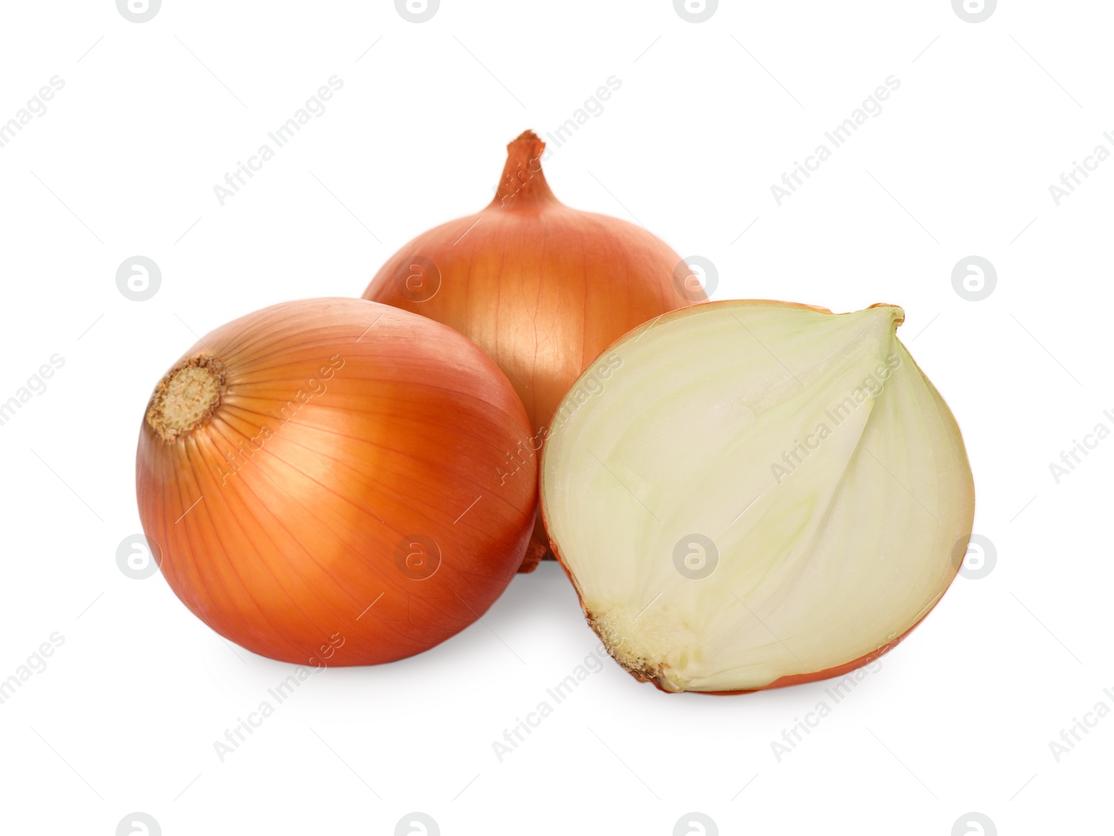 Photo of Whole and cut onions on white background