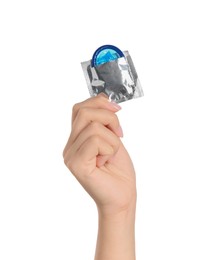 Photo of Woman holding condom on white background, closeup