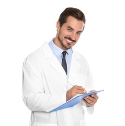 Photo of Young male doctor writing on clipboard against white background. Medical service
