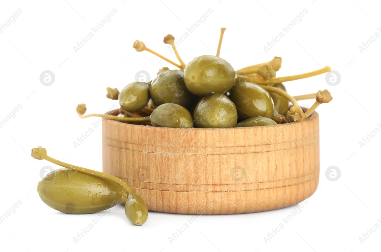Photo of Capers and wooden bowl isolated on white