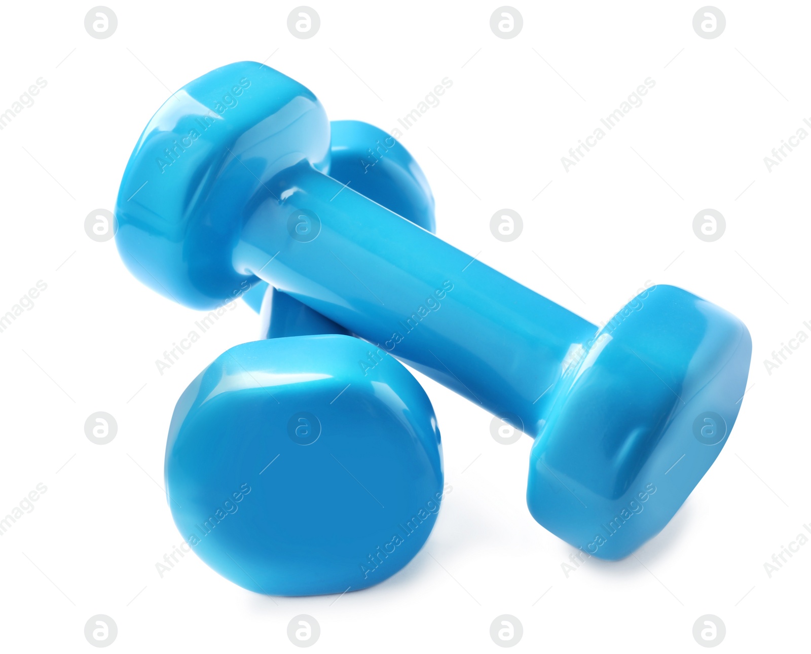 Photo of Color dumbbells on white background. Home fitness