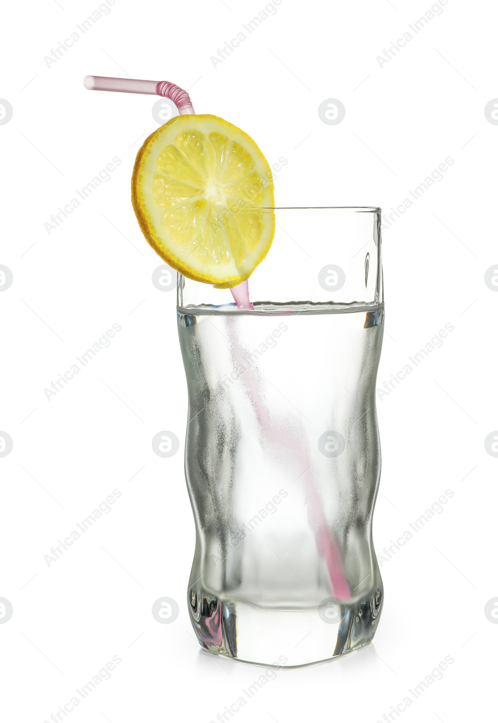 Photo of Glass of water with lemon and straw on white background. Refreshing drink