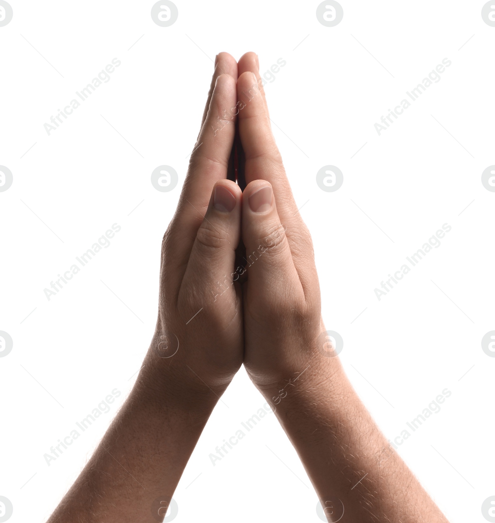 Photo of Religion. Christian man praying on white background, closeup