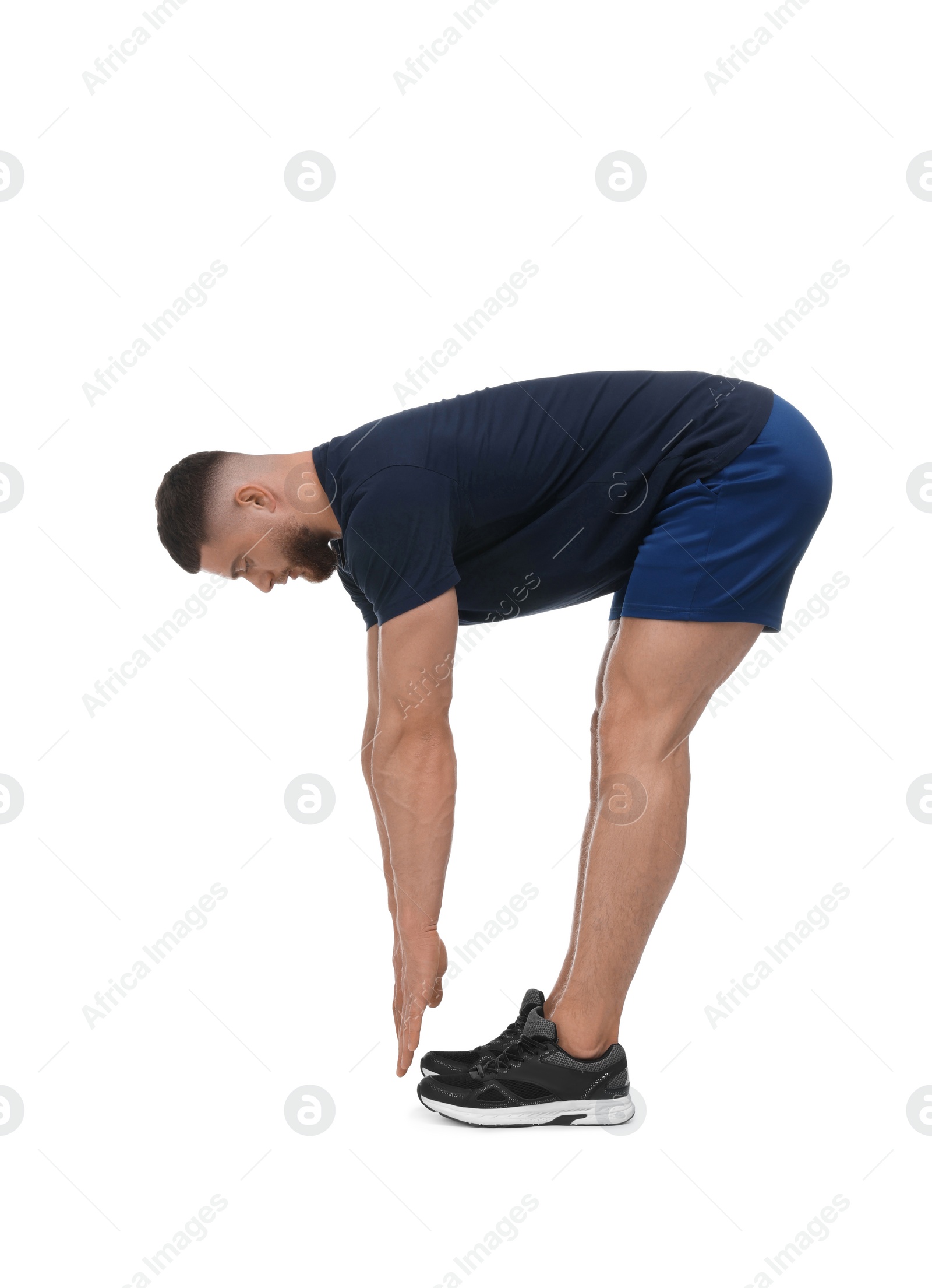 Photo of Man doing stretching on white background. Morning exercise