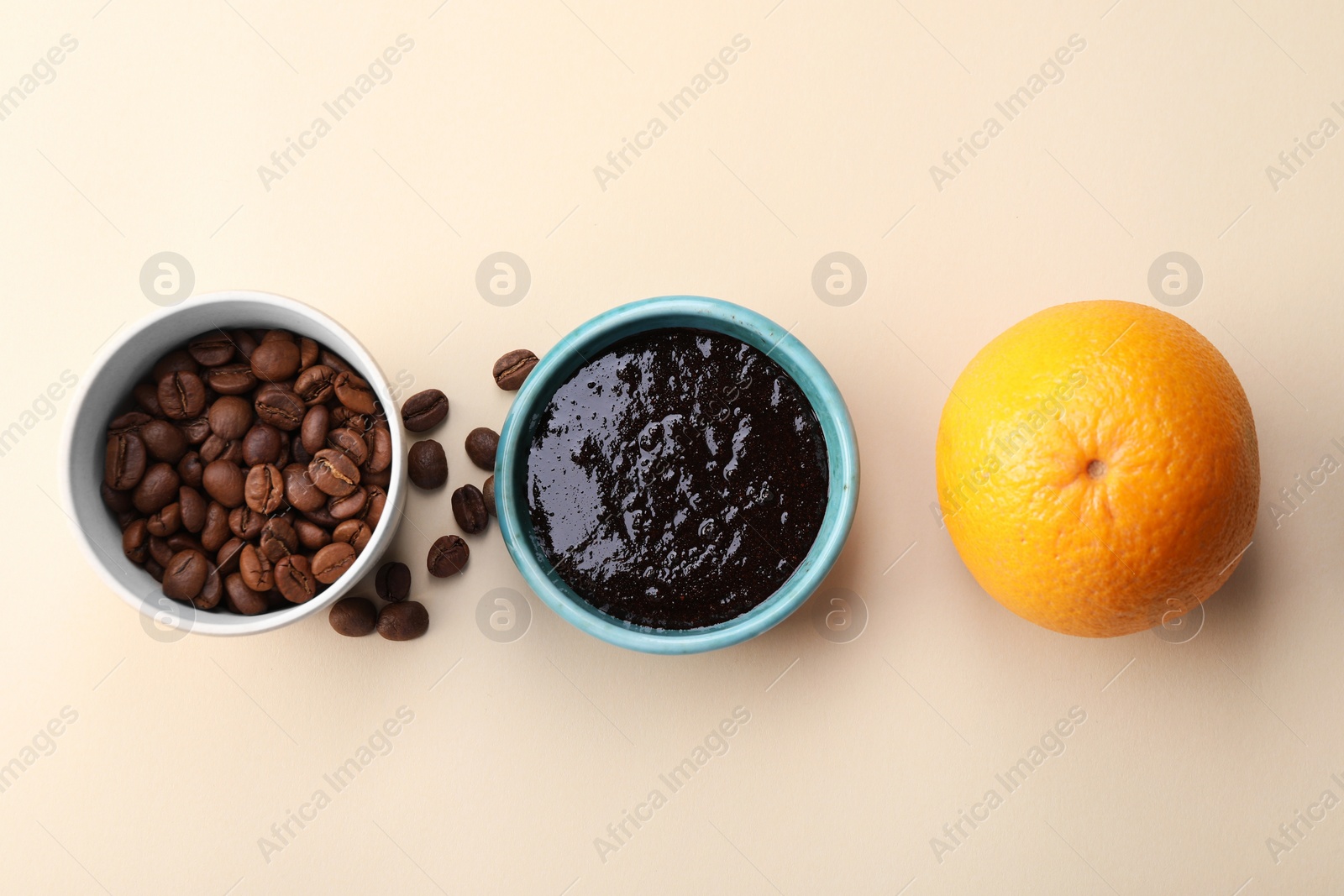 Photo of Flat lay composition with natural body scrub and fresh ingredients on beige background. Anti cellulite treatment