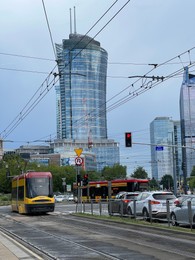 Photo of WARSAW, POLAND - JULY 11, 2022: Beautiful cityscape with Warsaw Spire skyscraper and traffic
