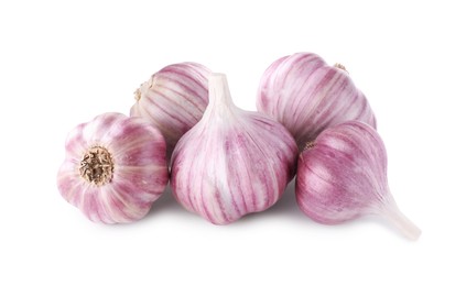 Pile of fresh raw garlic heads isolated on white