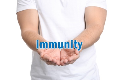 Image of Man demonstrating word Immunity on white background, closeup