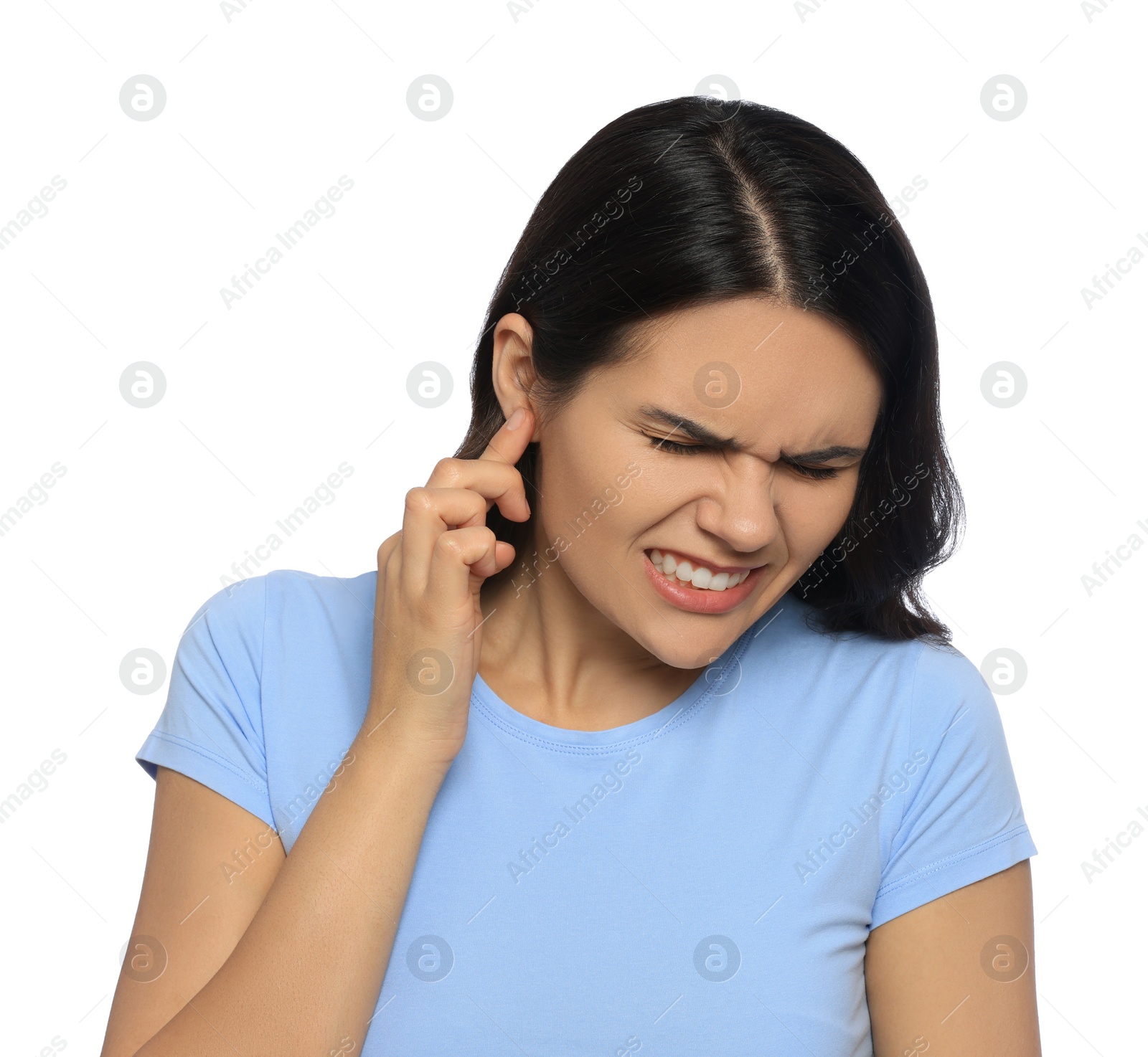 Photo of Young woman suffering from ear pain on white background