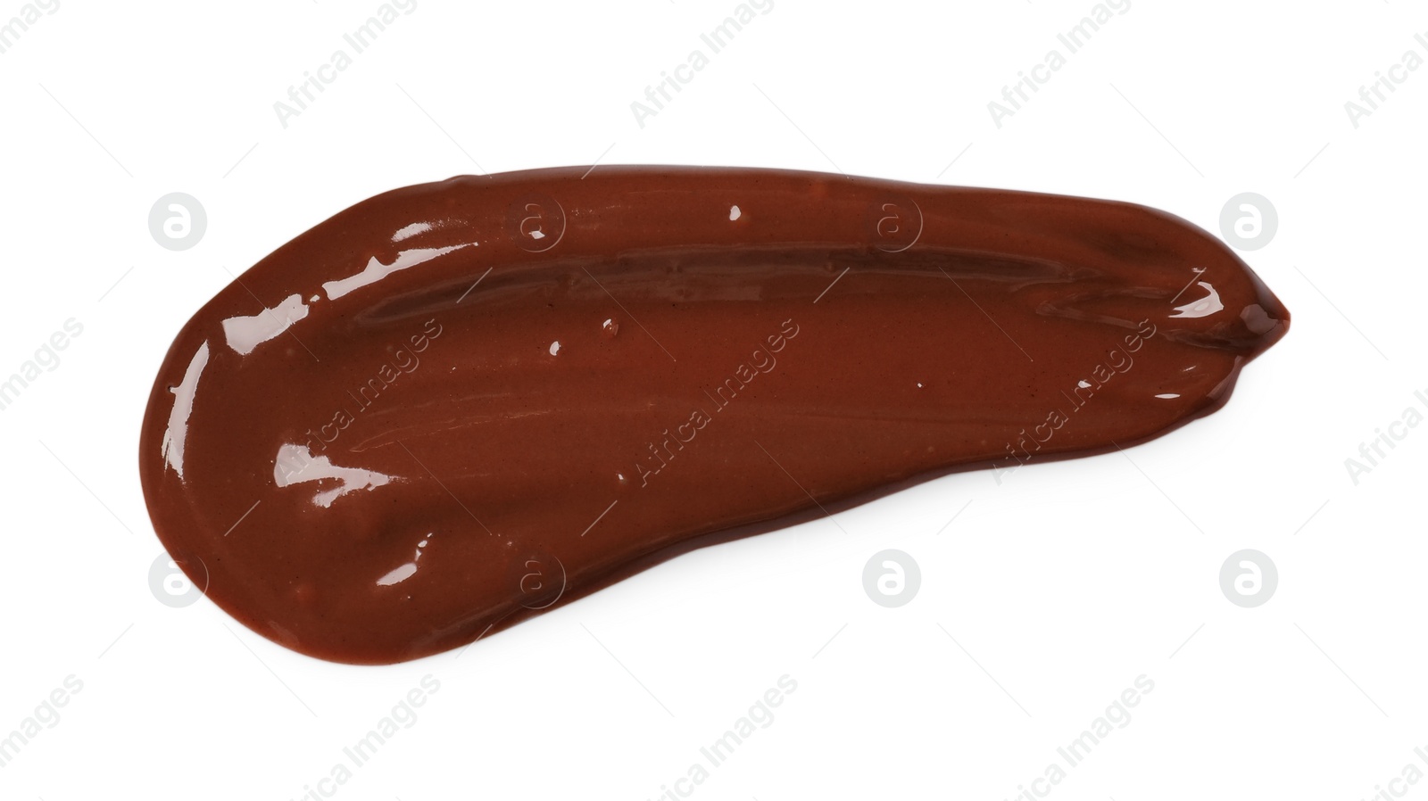 Photo of Smear of tasty melted milk chocolate isolated on white, top view