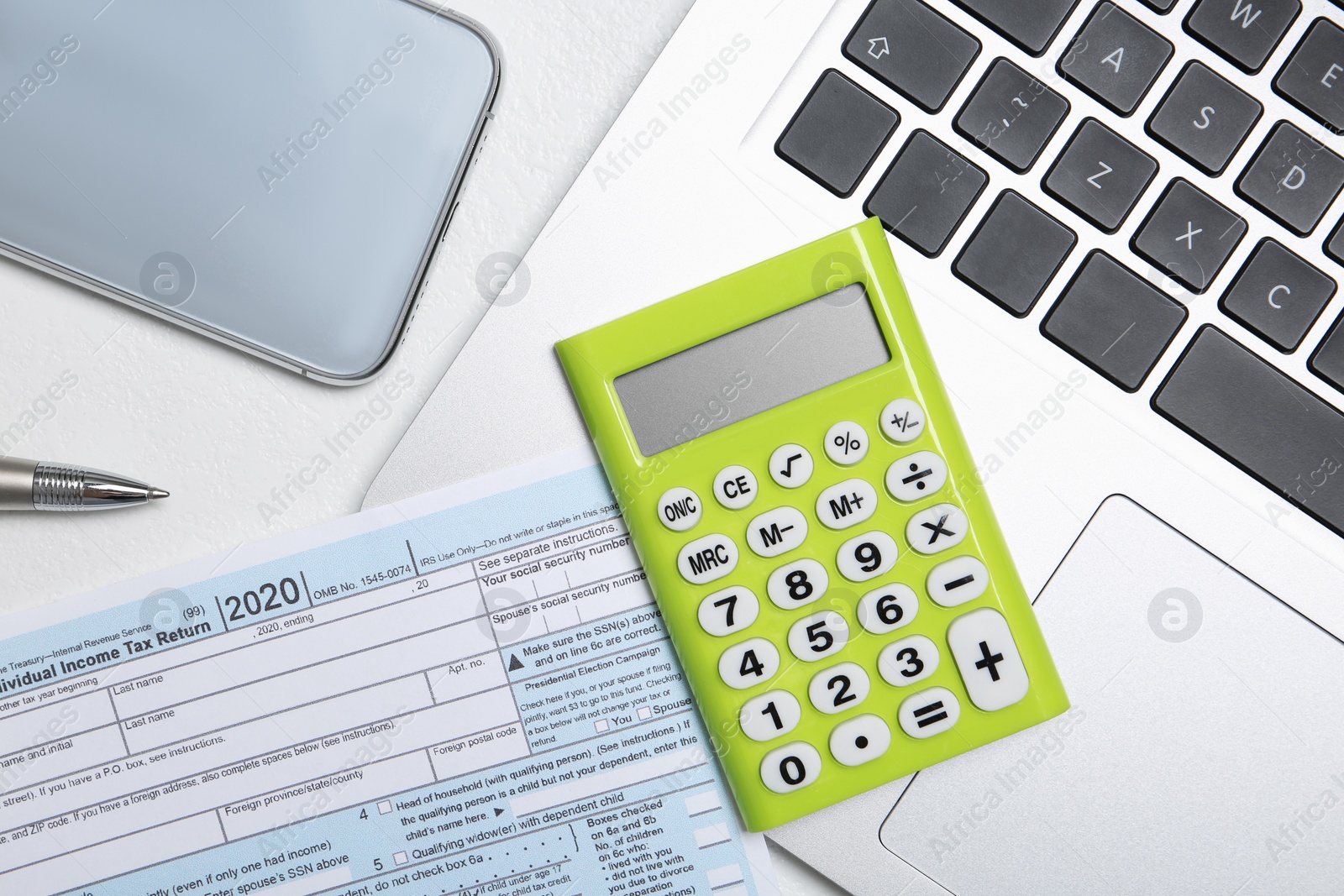 Photo of Flat lay composition with calculator and document on white table. Tax accounting