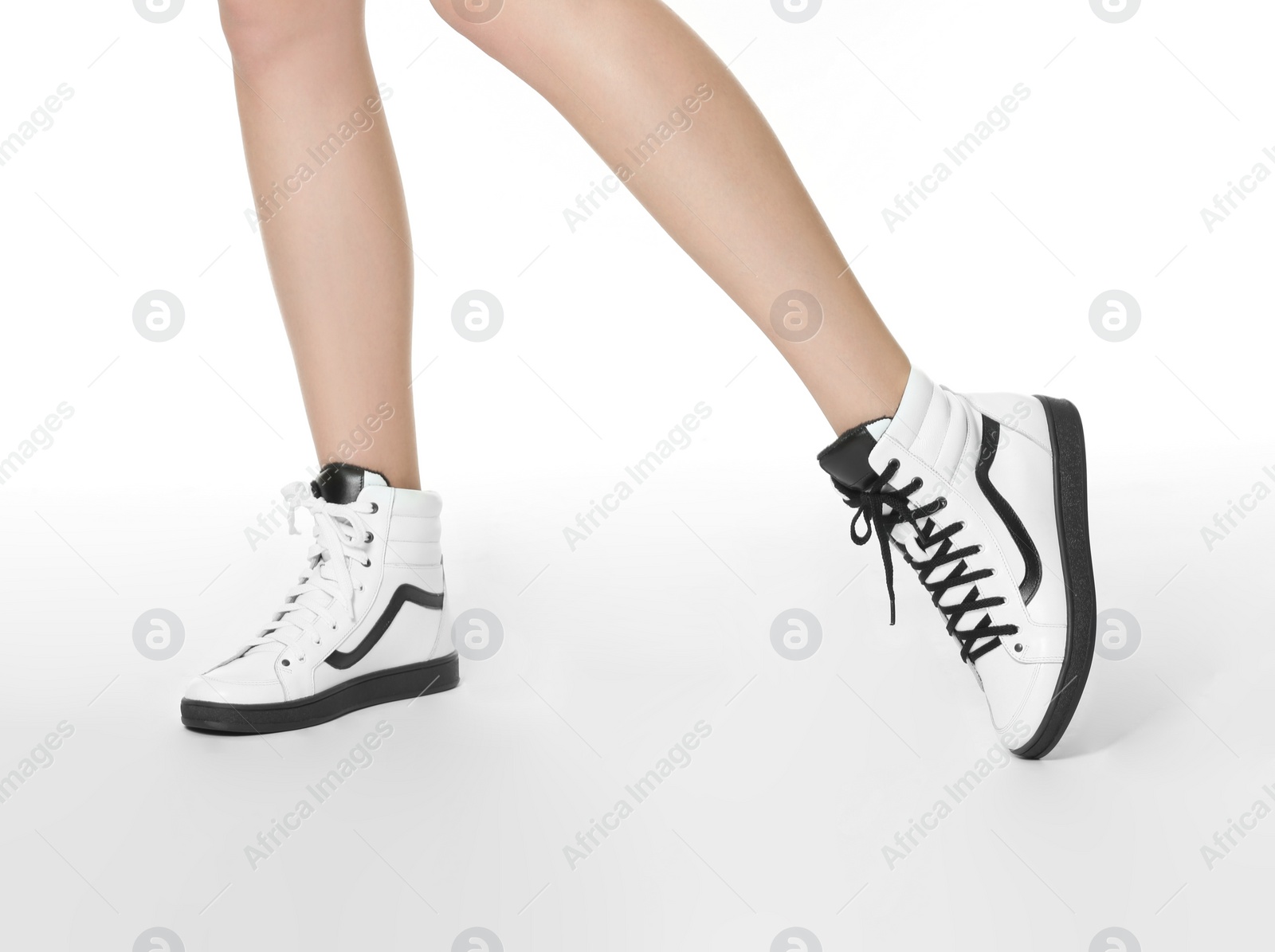 Photo of Woman in stylish shoes isolated on white, closeup