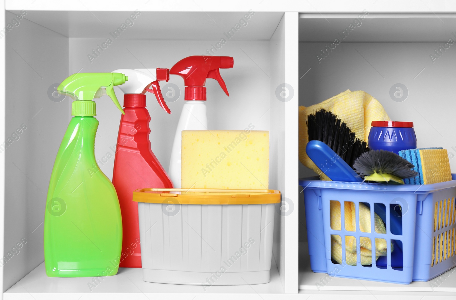 Photo of Different cleaning supplies and tools on shelves