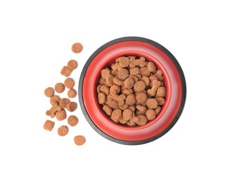 Photo of Dry pet food in feeding bowl isolated on white, top view