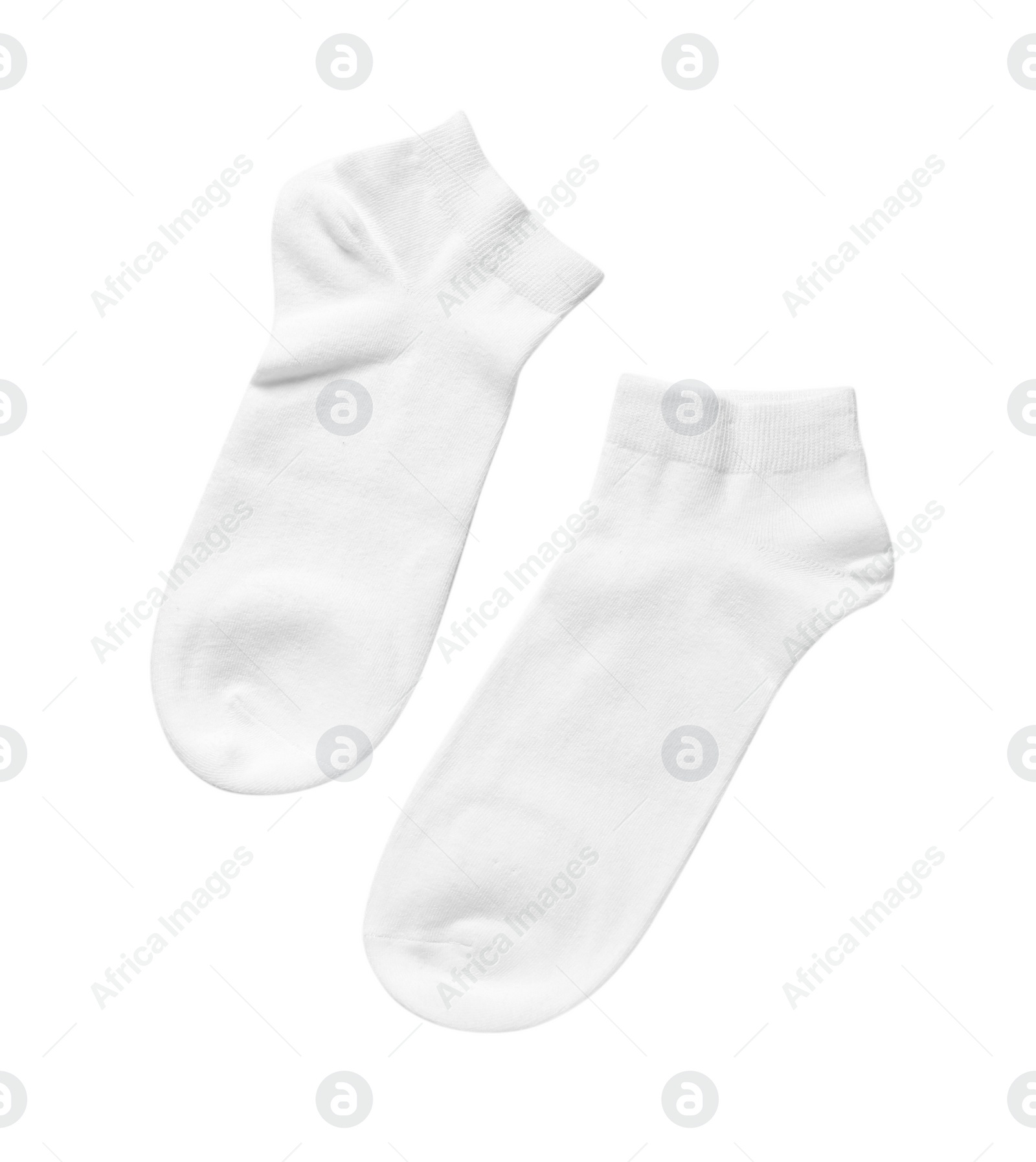 Photo of Pair of socks isolated on white, top view