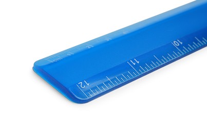 Photo of Ruler with measuring length markings in centimeters isolated on white