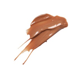 Photo of Smear of tasty melted milk chocolate isolated on white, top view