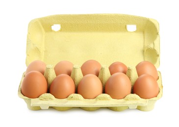 Photo of Chicken eggs in carton isolated on white
