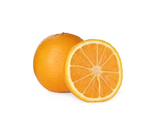 Photo of Cut and whole ripe oranges on white background
