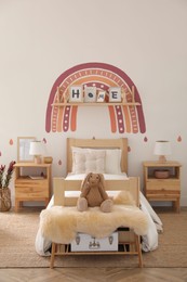 Photo of Modern girl's bedroom interior with stylish furniture. Idea for design