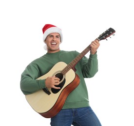 Photo of Man in Santa hat playing acoustic guitar on white background. Christmas music