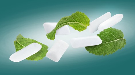 Image of Fresh mint leaves and chewing gum pads flying on teal background