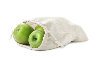 Photo of Cotton eco bag with apples isolated on white