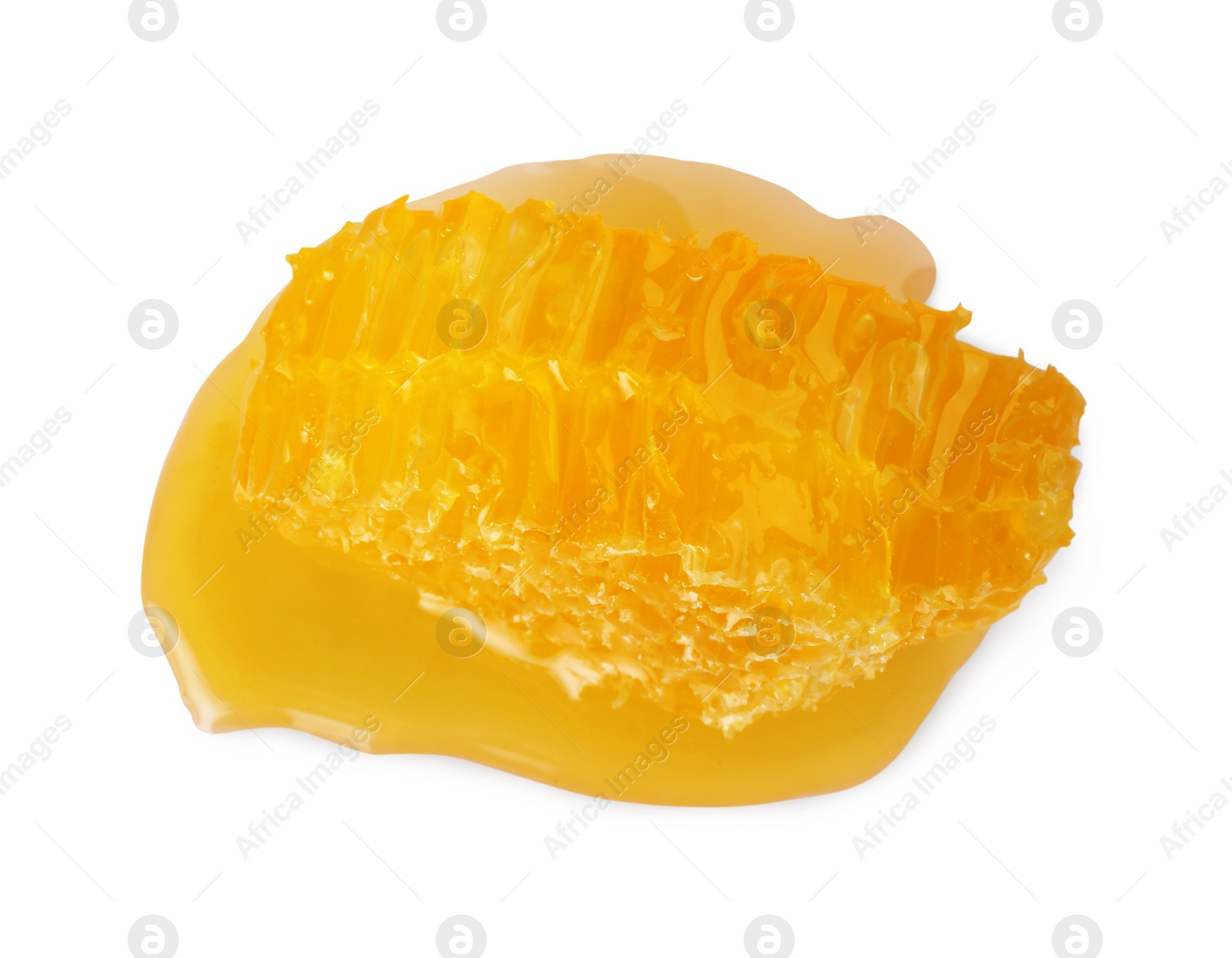 Photo of Piece of natural honeycomb with tasty honey isolated on white, top view