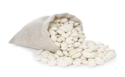 Photo of Overturned sack with navy beans on white background