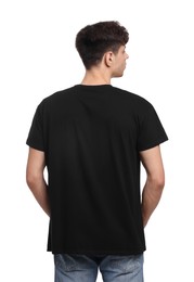 Young man wearing black t-shirt on white background, back view