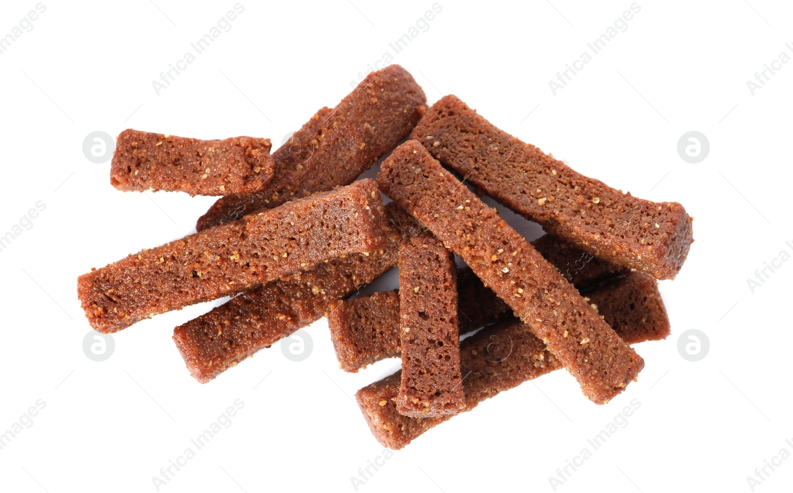 Photo of Pile of delicious crispy rusks on white background, top view