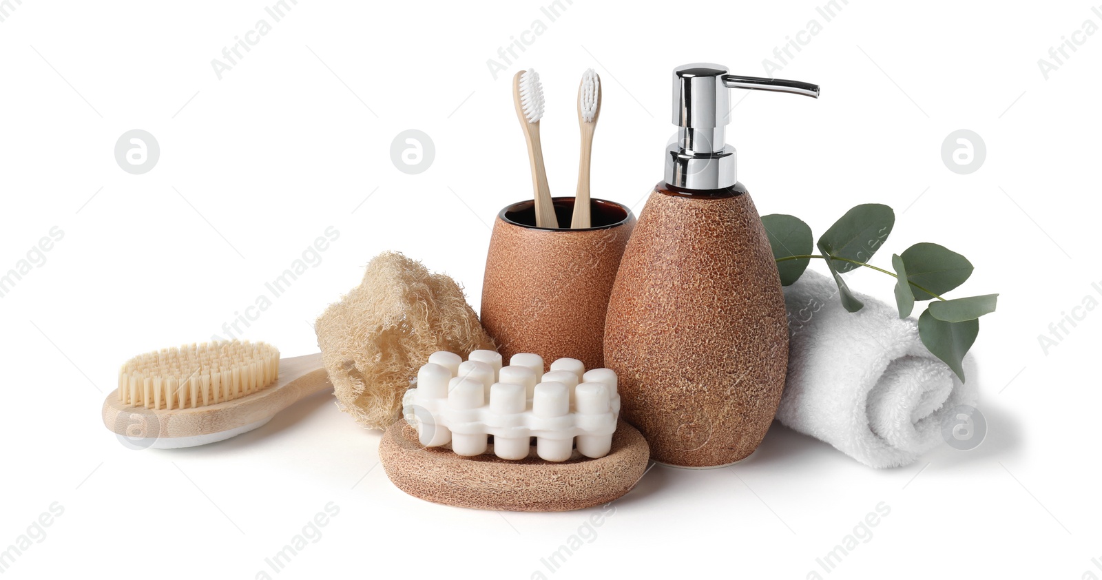 Photo of Bath accessories. Different personal care products and eucalyptus branch isolated on white