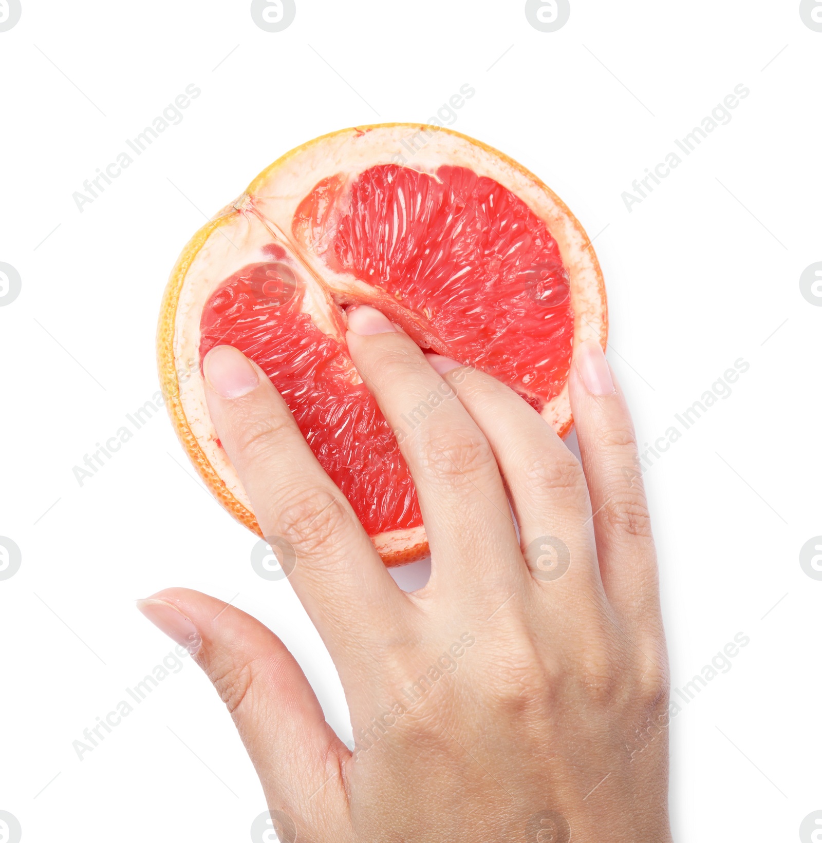 Photo of Young woman touching half of grapefruit on white background, top view. Sex concept