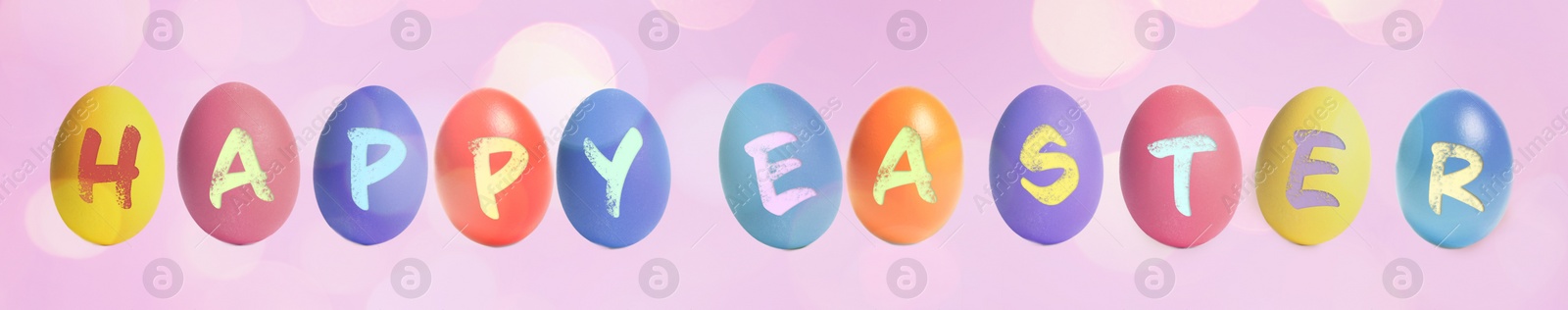 Image of Happy Easter. Colorful dyed eggs on pink background, banner design