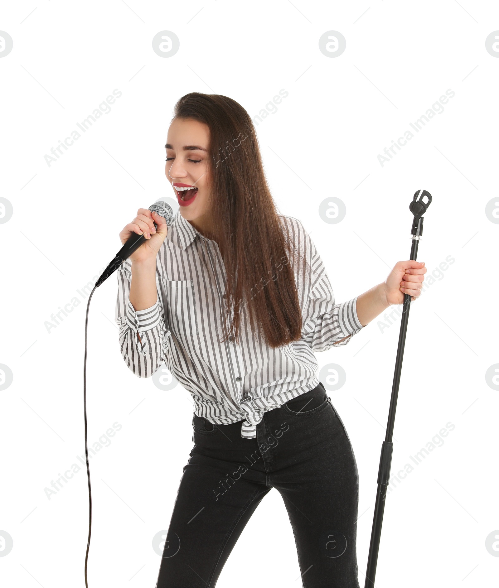 Photo of Young woman wearing casual clothes singing in microphone on white background