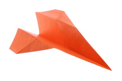 Photo of Handmade orange paper plane isolated on white