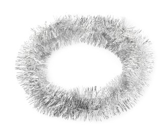 Photo of Shiny silver tinsel isolated on white, top view
