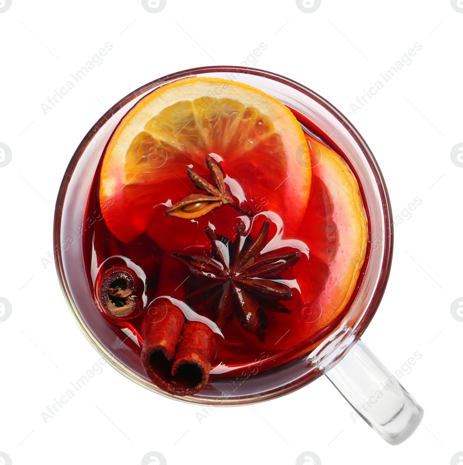 Photo of Cup with red mulled wine on white background, top view