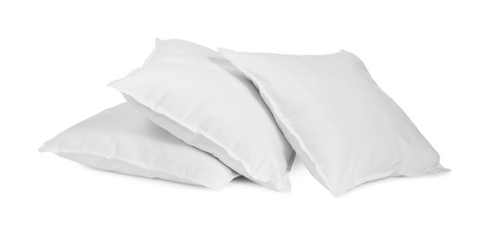 Three new soft pillows isolated on white