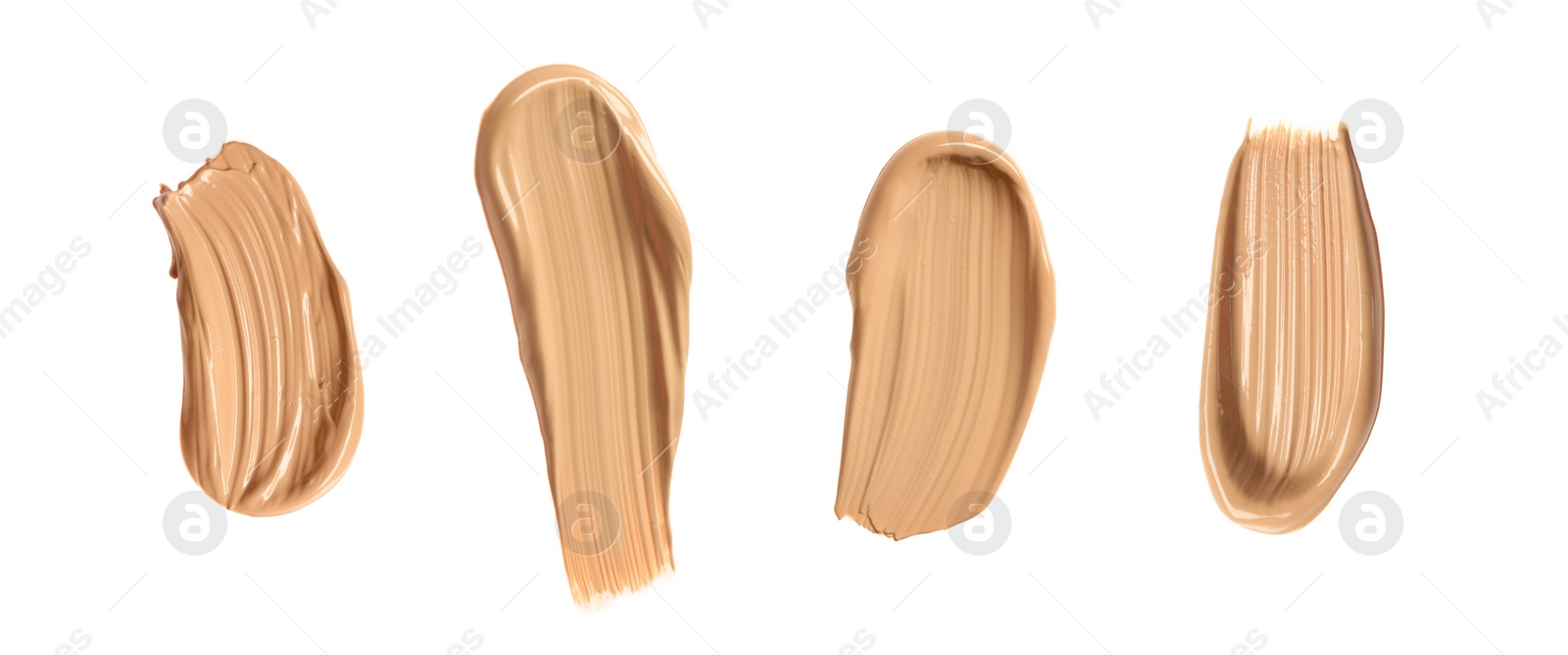 Image of Set with different shades of liquid skin foundation on white background, top view. Banner design