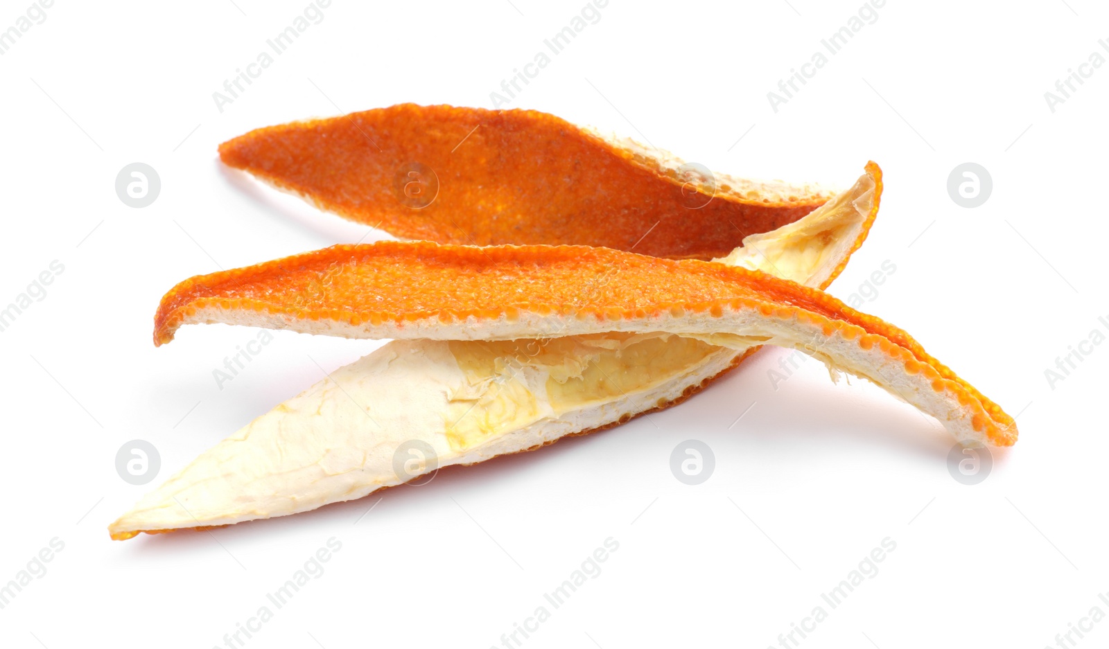 Photo of Dry orange fruit peels on white background