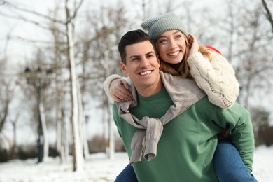 Photo of Beautiful happy couple outdoors on winter day