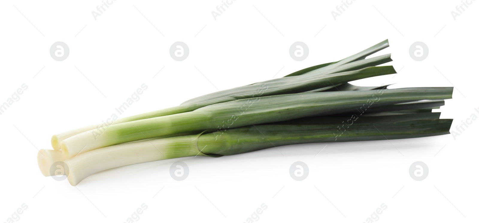 Photo of Fresh raw leeks on white background. Ripe onion